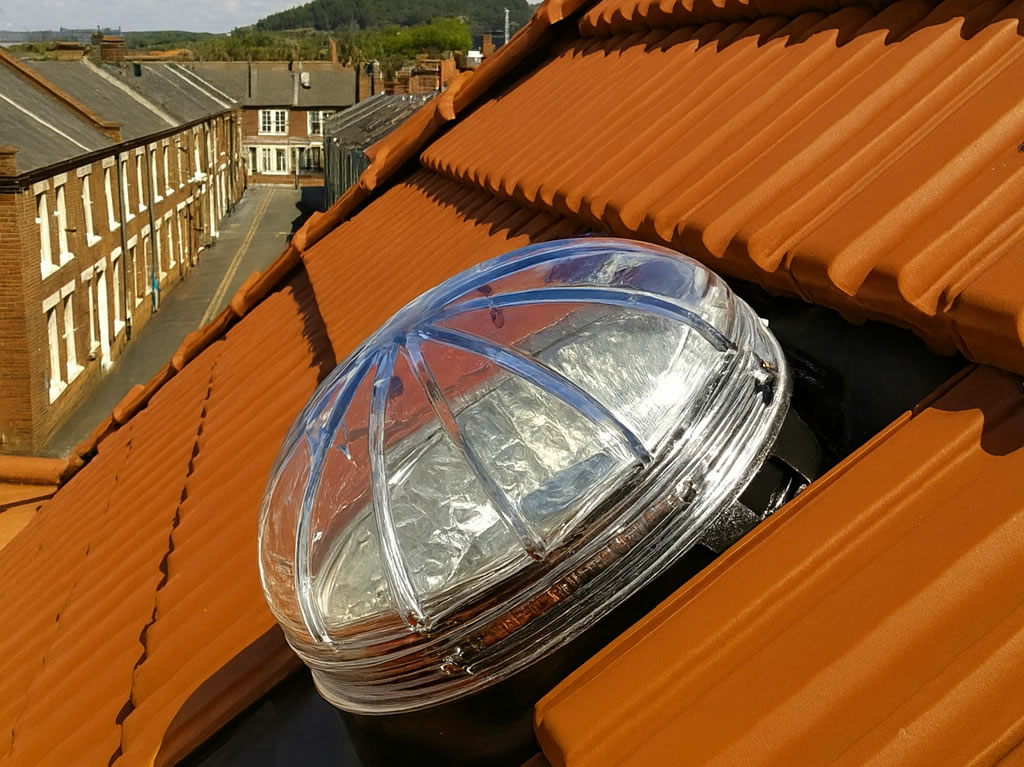 sun tunnel dome on tile roof in uk