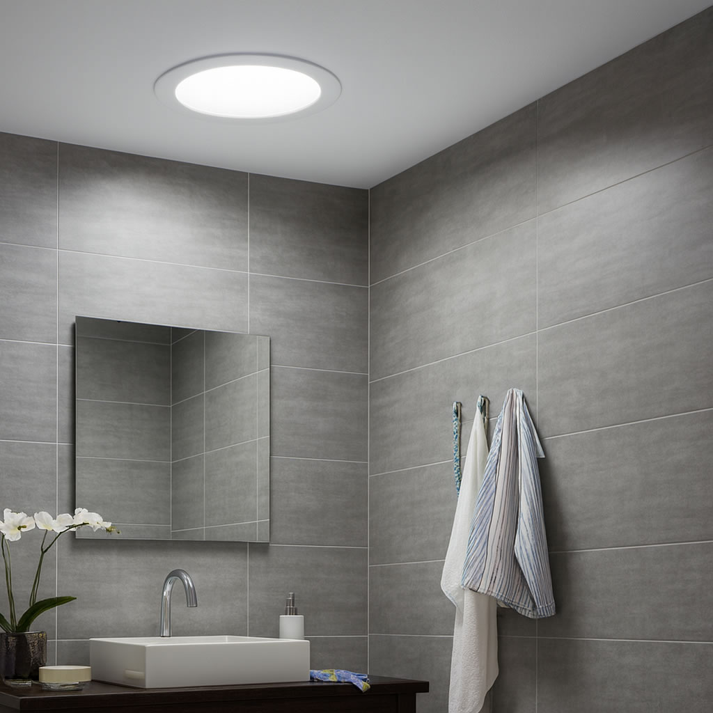 sun tunnel light in grey bathroom