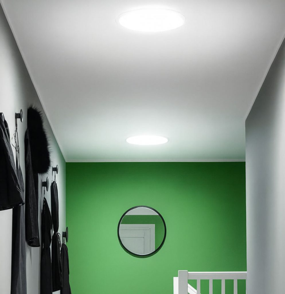 sun tunnels in hallway stair landing