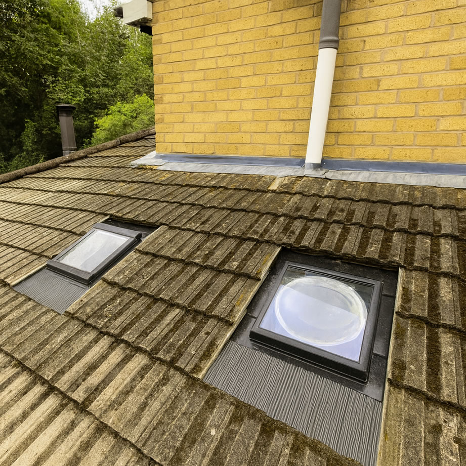 velux sun tunnels installation on concrete tile extension roof